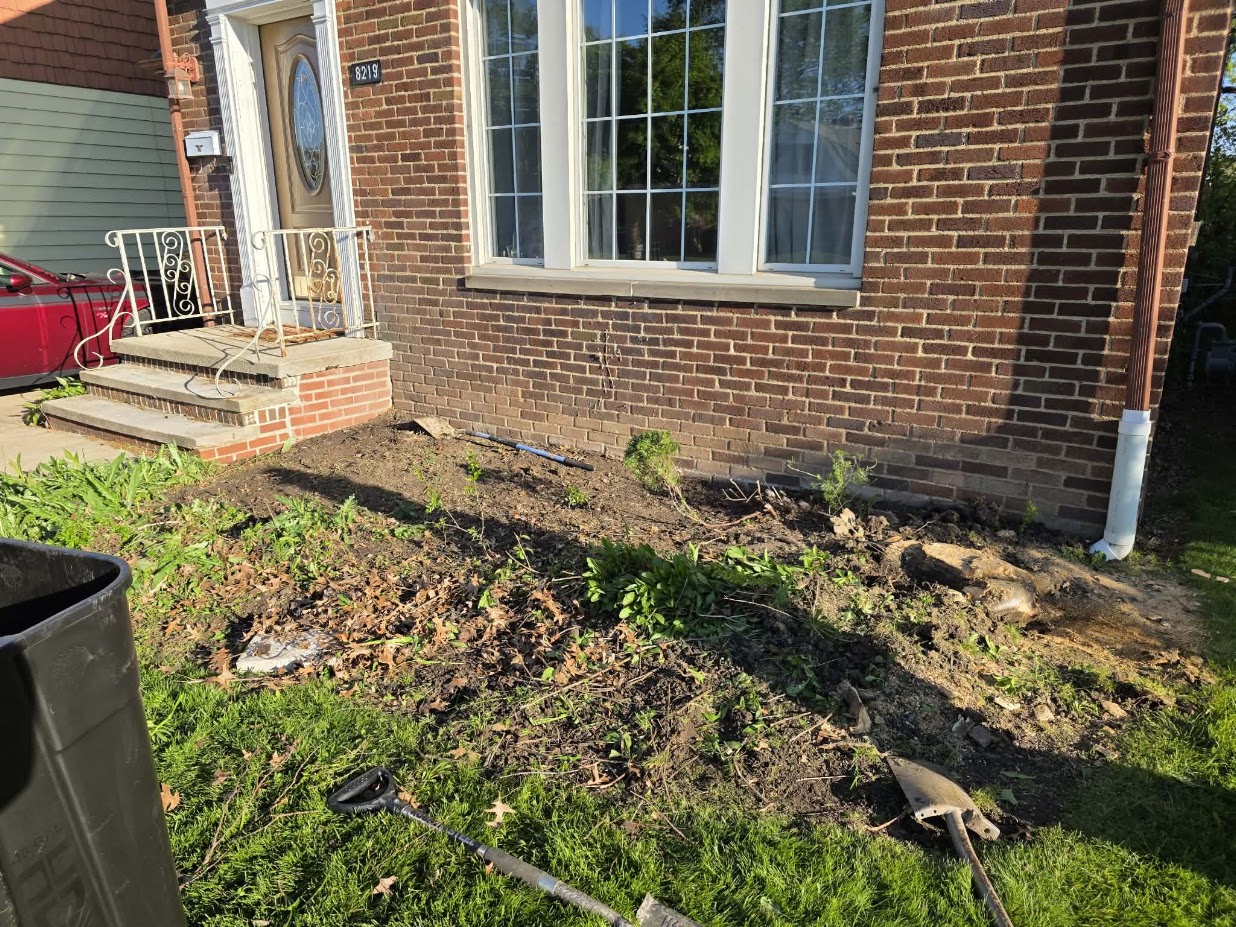 Real Mow Magic mulch bed transformation — Before